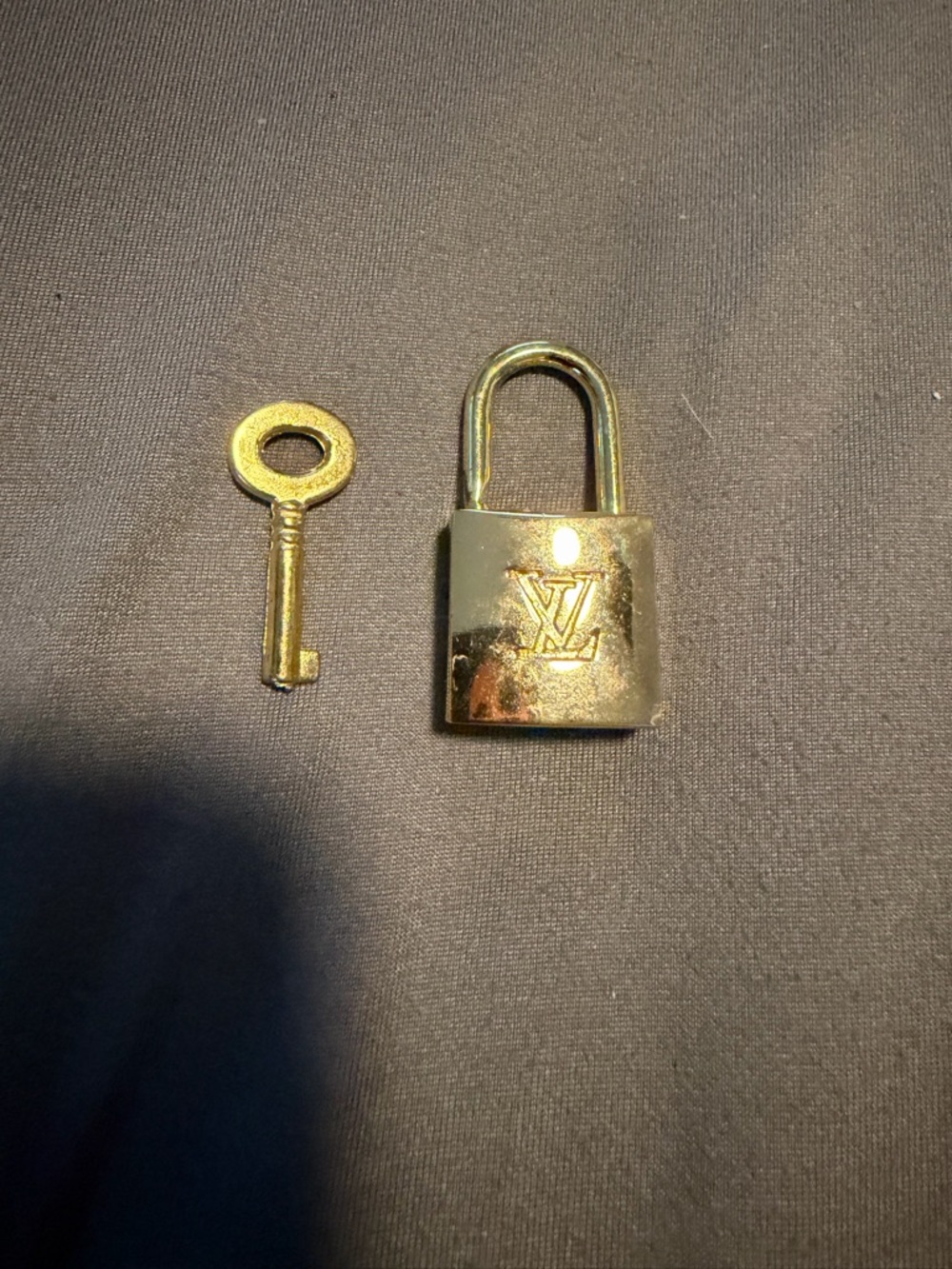 Louis Vuitton Brass-Tone Padlock and Key